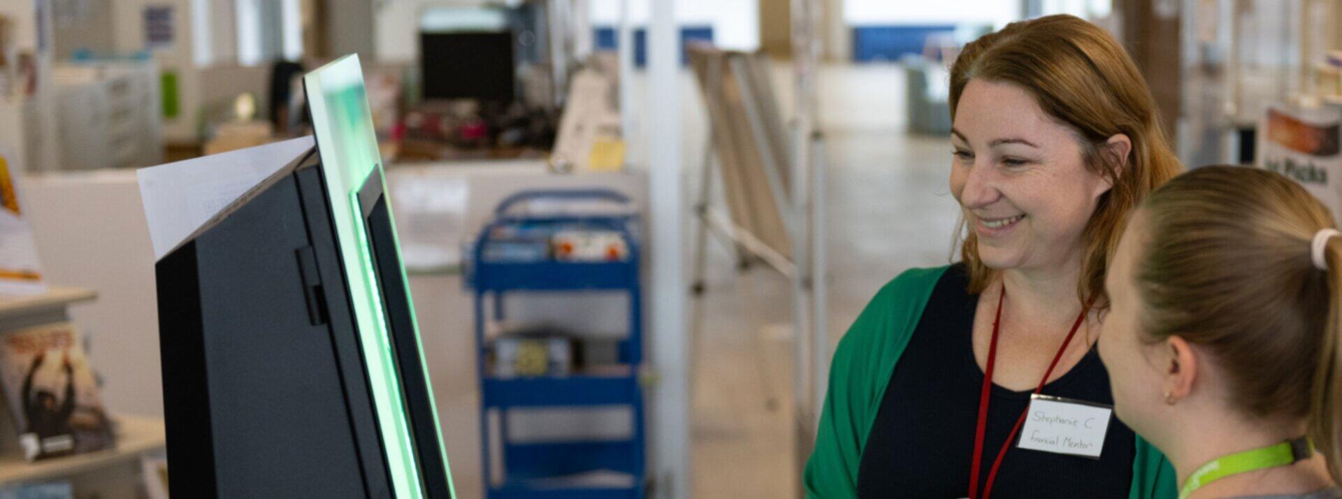 Staff Discuss Catalogue